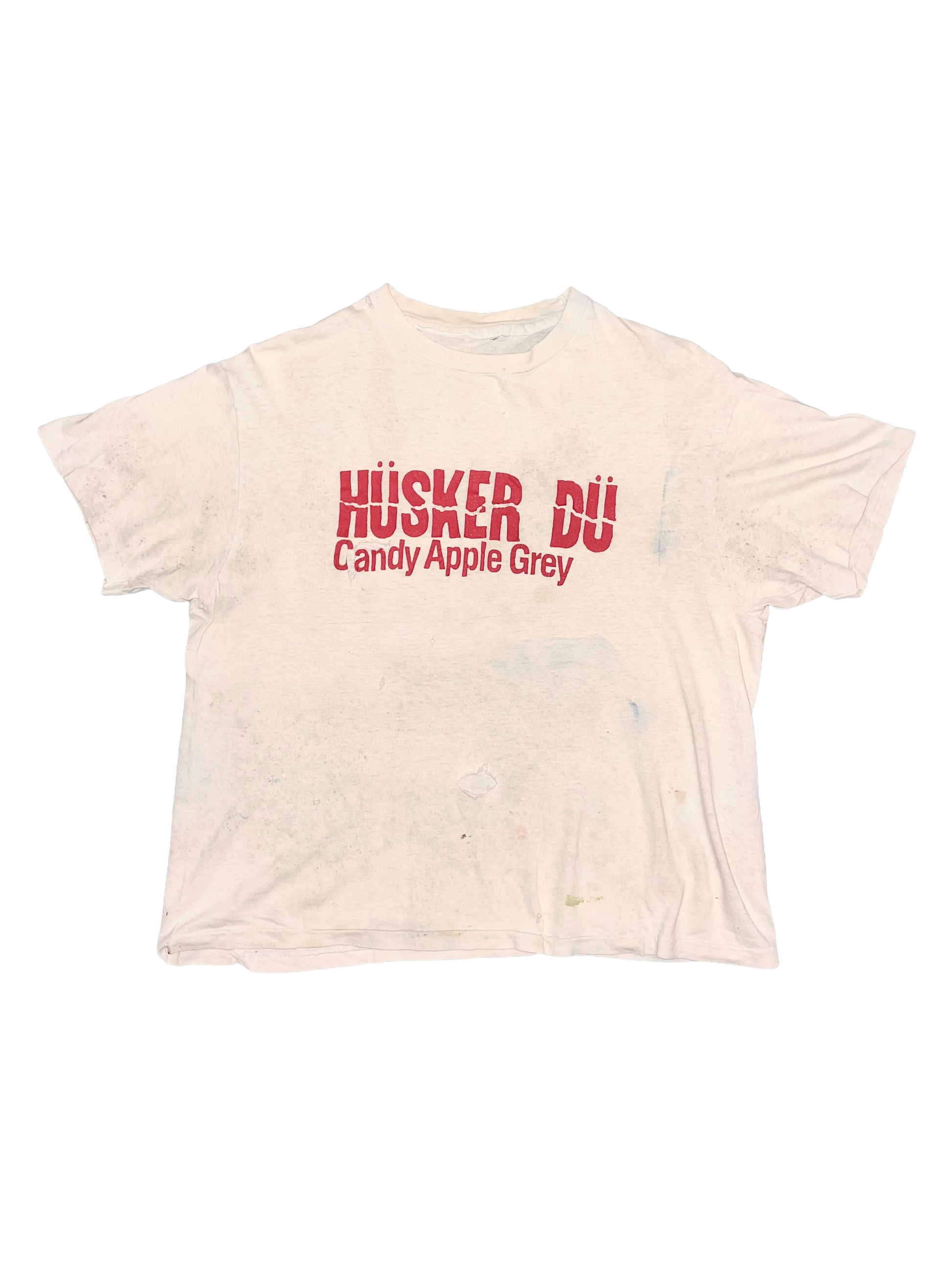 Grey t-shirt with red "Husker Du" text on a white background