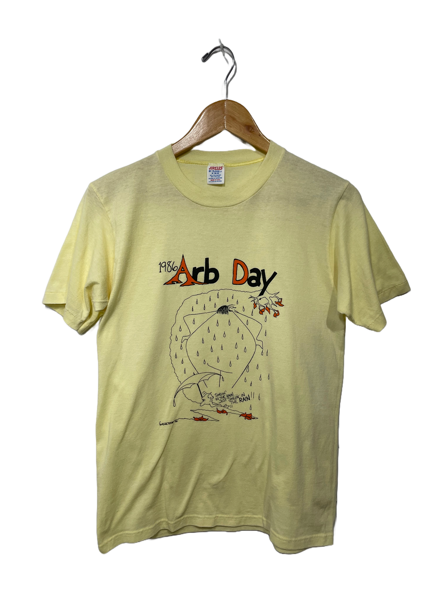 1986 Pale Yellow Arb Day Rain Graphic Tee